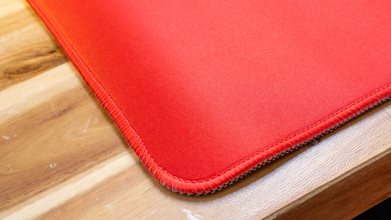 "OT" — Rust Deskmat