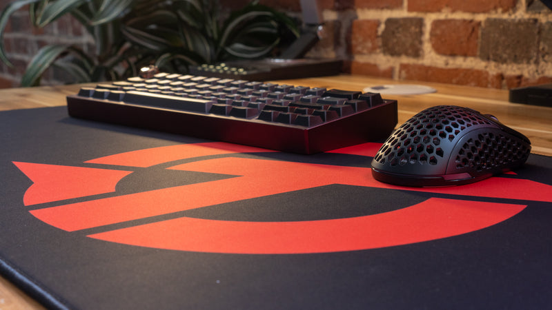 "OT" — Rust Deskmat