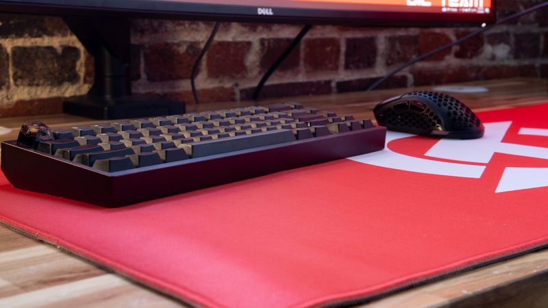 "OT" — Rust Deskmat